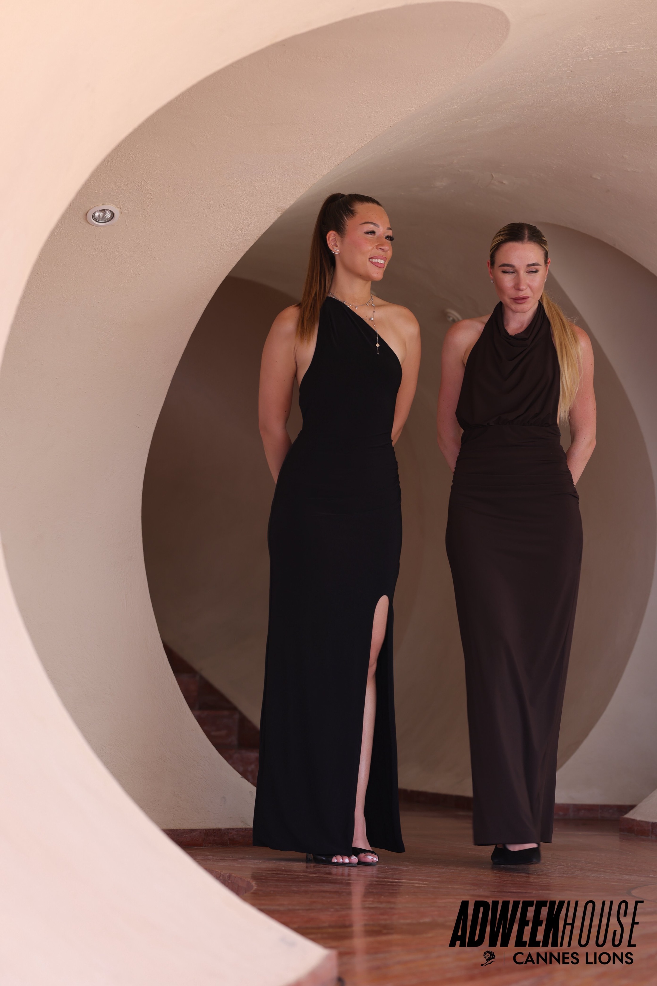 Guests pause for a portrait inside the arched Cannes venue