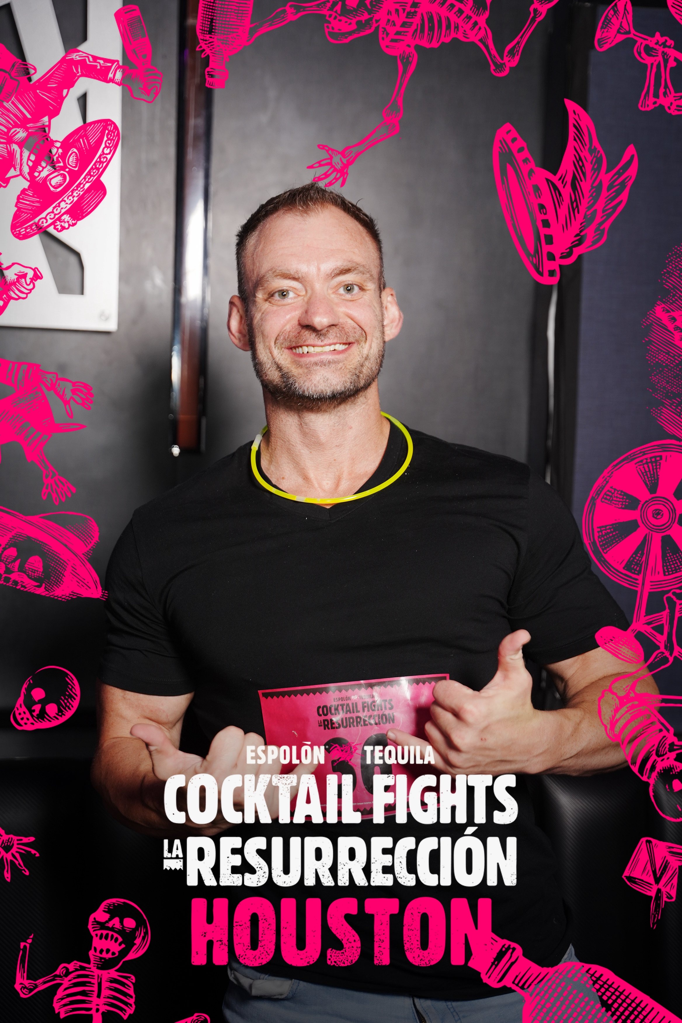 Guest wearing a numbered Cocktail Fights bib