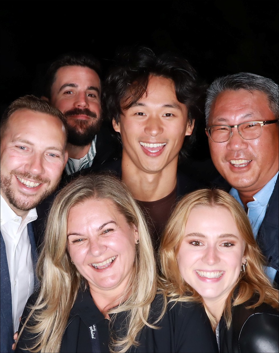 Guests posing for an evening selfie at Lamborghini Monterey Car Week