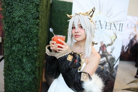 Cosplay guest with a cocktail at the Fandom party at Comic-Con